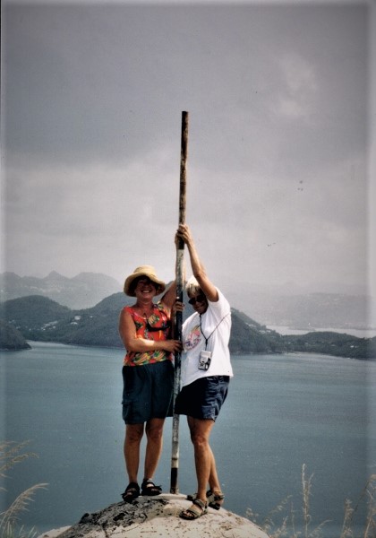 2002 St Lucia Kathy and Yvonne hold onto pole overlooking
      Rodney Bay