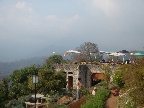 The patio of a restaurant that was
            on a mountain overlooking Antigua