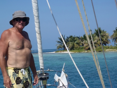 Brian mans
          the anchor in the Queen Cays of Belize