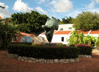 A courtyard that is
        surrounded by the Hulanda Museum in Otrabanda Curacao