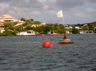 A Christmas Ball
        gets away from shore as we look towards Sarifundis in Spanish
        Waters