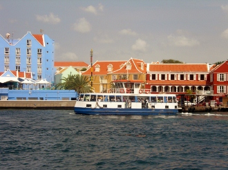 The ferry at Willemstad transports people
        from Punda to Otrabanda as the pontoon bridge was out