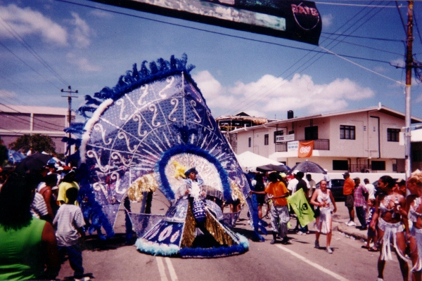 The King of the Carnival
          displays his fancy costume during the Main Parade