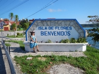 Kathy at the entrance to Flores Guatemala located near
            Tikal