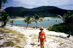 Kathy poses on the
        beach on the south side of Los Testigos