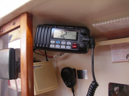 Installation of the VHF Marine Radio above the
          Nav Station and is accessible from the cockpit