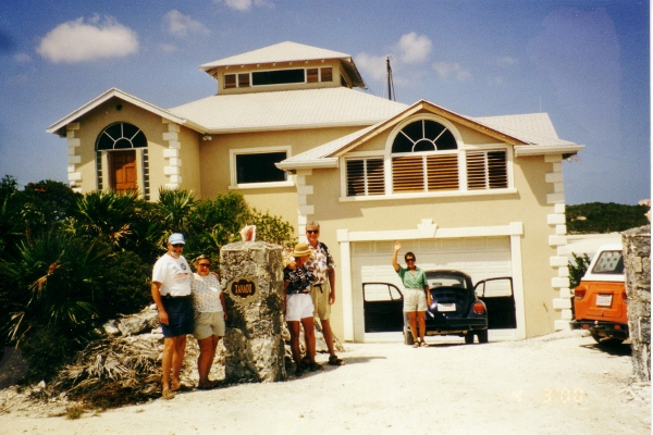 Outside Jim and Jane by their newly
          constucted house in the Turks and Caicos newly