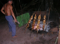 Cooking the chicken at our base camp at Angel Falls