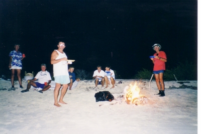 We party on the beach after dark as we
          ignore suspicious activity offshore