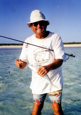 Brian catches a bone fish off Ragged
          Island in the Bahammas