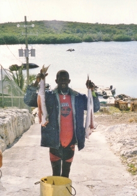 A local Ragged Island Fisherman shows us
          his catch for the day