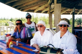 Relaxing with
          Karen and Kelly in the Abacos 1999