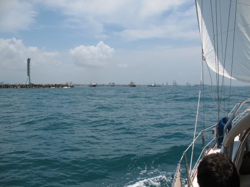 Sailing into the entrance to the Panama Canal Zone at
        Colon