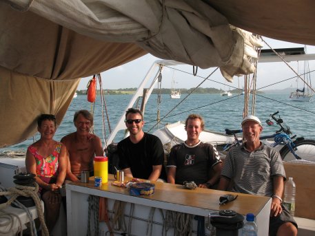 The crew on the German Catamaran with the skipper on
        the right
