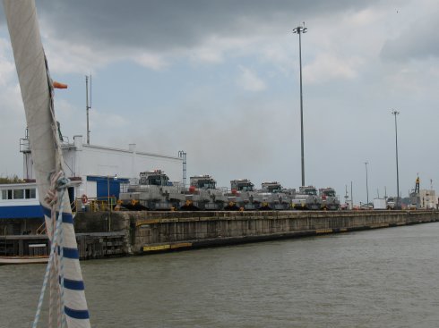 Mechanical Mules alongside a lock used to assist the
        ships passing through