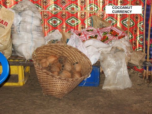Inside a typical
        Kuna store with goods and coconut cash shown
