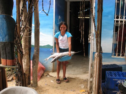 Local girl brings in our lunch for preparation