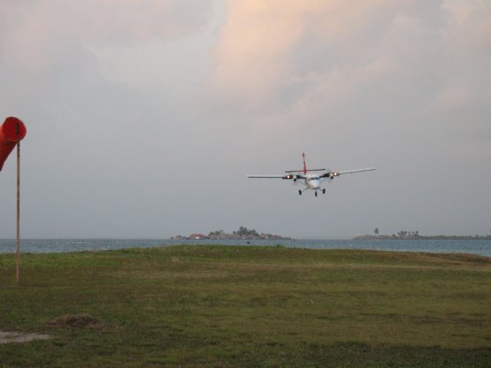 Plane lands at
        Porvenir with Johnny and Jeannie aboard