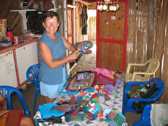 Kathy buys molas
        from Dona in her store