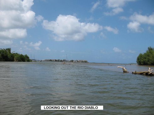 Looking out the mouth of the Rio Diablo from the
        dinghy